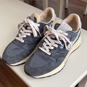 Autry Navy and Cream Reelwind sneakers.